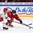 HELSINKI, FINLAND - JANUARY 3: Belarus' Grigori Veremyov #15 battles for the puck with Switzerland's Julien Privet #11 during relegation round action at the 2016 IIHF World Junior Championship. (Photo by Matt Zambonin/HHOF-IIHF Images)

